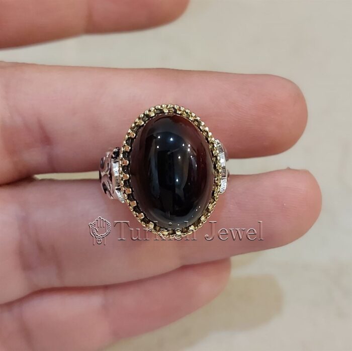 Black Aqeeq Ring Dark Black Agate 925 Silver Ring 2 Turkish Jewel Superior Quality Handmade Design on Sides. Pure and Natural Black Aqeeq (Agate) stone. Heavy and strong ring made with 925 Silver metal. <p class="LC20lb MBeuO DKV0Md">⭐ Highest Quality Silver 925</p> ⭐ Durable & Strong Design <p class="LC20lb MBeuO DKV0Md">⭐ Lifetime Silver Gurantee</p>