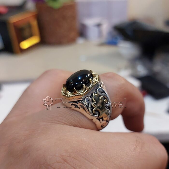 Black Aqeeq agate ring 925 Silver 2 Turkish Jewel Superior Quality Handmade Design on Sides. Pure and Natural Black Aqeeq (Agate) stone. Heavy and strong ring made with 925 Silver metal. <p class="LC20lb MBeuO DKV0Md">⭐ Highest Quality Silver 925</p> ⭐ Durable & Strong Design <p class="LC20lb MBeuO DKV0Md">⭐ Lifetime Silver Gurantee</p>