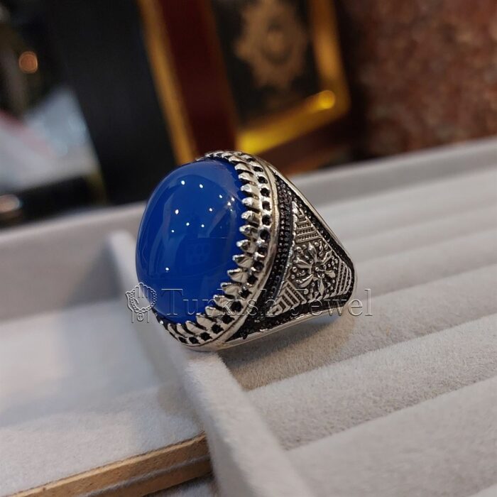 Natural Blue Agate Blue Aqeeq Stone Ring 925 Silver 1 Turkish Jewel <h3>Hand Engraved - Blue Agate</h3> Superior Quality Handmade Design on Sides. Pure and Natural Blue Aqeeq (Blue Agate) stone. Heavy and strong ring made with 925 Silver metal. <p class="LC20lb MBeuO DKV0Md">⭐ Highest Quality Silver 925</p> ⭐ Durable & Strong Design <p class="LC20lb MBeuO DKV0Md">⭐ Lifetime Silver Gurantee</p>