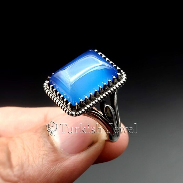 Natural Blue Agate Blue Aqeeq Stone Ring 925 Silver 11 Turkish Jewel <h3>Hand Engraved - Blue Agate</h3> Superior Quality Handmade Design on Sides. Pure and Natural Blue Aqeeq (Blue Agate) stone. Heavy and strong ring made with 925 Silver metal. <p class="LC20lb MBeuO DKV0Md">⭐ Highest Quality Silver 925</p> ⭐ Durable & Strong Design <p class="LC20lb MBeuO DKV0Md">⭐ Lifetime Silver Gurantee</p>