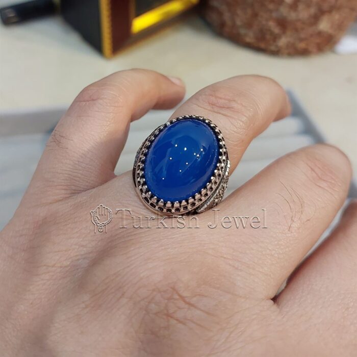 Natural Blue Agate Blue Aqeeq Stone Ring 925 Silver 12 Turkish Jewel <h3>Hand Engraved - Blue Agate</h3> Superior Quality Handmade Design on Sides. Pure and Natural Blue Aqeeq (Blue Agate) stone. Heavy and strong ring made with 925 Silver metal. <p class="LC20lb MBeuO DKV0Md">⭐ Highest Quality Silver 925</p> ⭐ Durable & Strong Design <p class="LC20lb MBeuO DKV0Md">⭐ Lifetime Silver Gurantee</p>