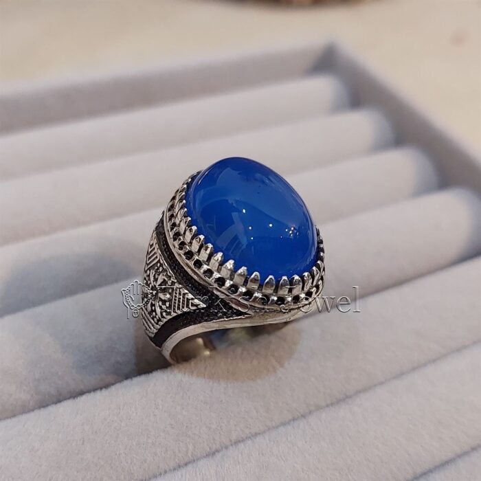 Natural Blue Agate Blue Aqeeq Stone Ring 925 Silver 14 Turkish Jewel <h3>Hand Engraved - Blue Agate</h3> Superior Quality Handmade Design on Sides. Pure and Natural Blue Aqeeq (Blue Agate) stone. Heavy and strong ring made with 925 Silver metal. <p class="LC20lb MBeuO DKV0Md">⭐ Highest Quality Silver 925</p> ⭐ Durable & Strong Design <p class="LC20lb MBeuO DKV0Md">⭐ Lifetime Silver Gurantee</p>
