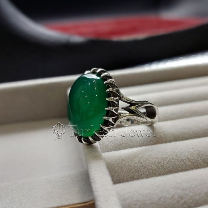 Natural Green Agate Sabz Aqeeq Ring 925 Silver 1 Turkish Jewel <h3>Hand Engraved - Green Agate</h3> Superior Quality Handmade Design on Sides. Pure and Natural Green Aqeeq (Sabz Agate) stone. Heavy and strong ring made with 925 Silver metal. <p class="LC20lb MBeuO DKV0Md">⭐ Highest Quality Silver 925</p> ⭐ Durable & Strong Design <p class="LC20lb MBeuO DKV0Md">⭐ Lifetime Silver Gurantee</p>