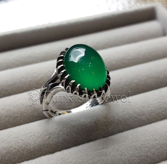 Natural Green Agate Sabz Aqeeq Ring 925 Silver 9 e1692047823809 Turkish Jewel <h3>Hand Engraved - Green Agate</h3> Superior Quality Handmade Design on Sides. Pure and Natural Green Aqeeq (Sabz Agate) stone. Heavy and strong ring made with 925 Silver metal. <p class="LC20lb MBeuO DKV0Md">⭐ Highest Quality Silver 925</p> ⭐ Durable & Strong Design <p class="LC20lb MBeuO DKV0Md">⭐ Lifetime Silver Gurantee</p>