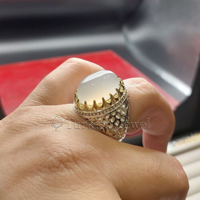 White Aqeeq White Agate Ring 925 Silver 3 Turkish Jewel <h3>Hand Engraved - White Agate (White Aqeeq)</h3> Superior Quality Handmade Design on Sides. Pure and Natural White Agate (White Aqeeq) stone. Heavy and strong ring made with 925 Silver metal. <p class="LC20lb MBeuO DKV0Md">⭐ Highest Quality Silver 925</p> ⭐ Durable & Strong Design <p class="LC20lb MBeuO DKV0Md">⭐ Lifetime Silver Gurantee</p>