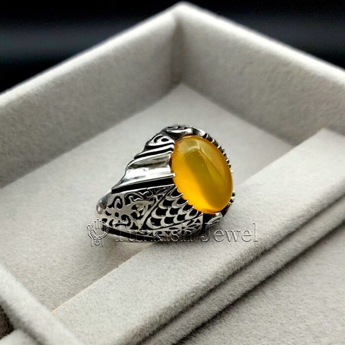 Yellow Agate Aqeeq Stone Ring in real silver (1) Yellow Agate Aqeeq Stone Ring in real silver 1 Turkish Jewel <h3>Hand Engraved - Yellow Agate</h3> Superior Quality Handmade Design on Sides. Pure and Natural Yellow Aqeeq (Sabz Agate) stone. Heavy and strong ring made with 925 Silver metal. <p class="LC20lb MBeuO DKV0Md">⭐ Highest Quality Silver 925</p> ⭐ Durable & Strong Design <p class="LC20lb MBeuO DKV0Md">⭐ Lifetime Silver Gurantee</p>