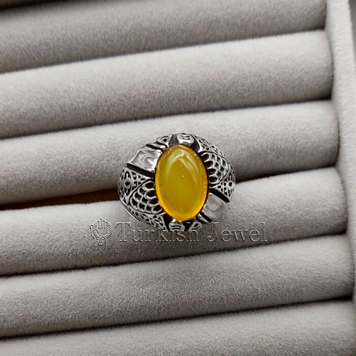 Yellow Agate Aqeeq Stone Ring in real silver (2) Yellow Agate Aqeeq Stone Ring in real silver 2 Turkish Jewel <h3>Hand Engraved - Yellow Agate</h3> Superior Quality Handmade Design on Sides. Pure and Natural Yellow Aqeeq (Sabz Agate) stone. Heavy and strong ring made with 925 Silver metal. <p class="LC20lb MBeuO DKV0Md">⭐ Highest Quality Silver 925</p> ⭐ Durable & Strong Design <p class="LC20lb MBeuO DKV0Md">⭐ Lifetime Silver Gurantee</p>
