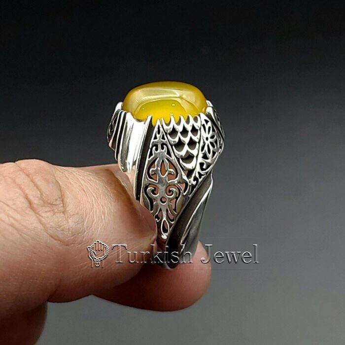 Yellow Agate Aqeeq Stone Ring in real silver (5) Yellow Agate Aqeeq Stone Ring in real silver 5 Turkish Jewel <h3>Hand Engraved - Yellow Agate</h3> Superior Quality Handmade Design on Sides. Pure and Natural Yellow Aqeeq (Sabz Agate) stone. Heavy and strong ring made with 925 Silver metal. <p class="LC20lb MBeuO DKV0Md">⭐ Highest Quality Silver 925</p> ⭐ Durable & Strong Design <p class="LC20lb MBeuO DKV0Md">⭐ Lifetime Silver Gurantee</p>