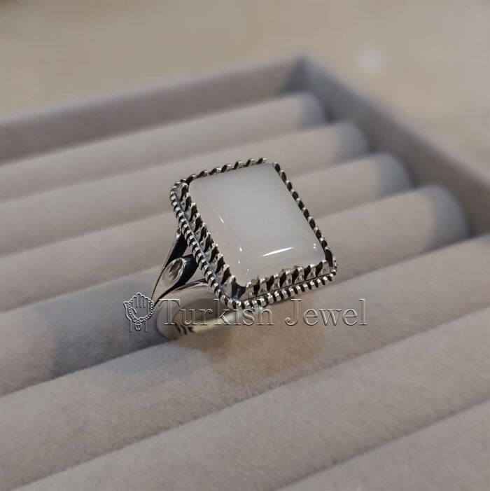 white aqeeq stone ring 925 Silver White agate 1 Turkish Jewel <h3>Hand Engraved - White Agate (White Aqeeq)</h3> Superior Quality Handmade Design on Sides. Pure and Natural White Agate (White Aqeeq) stone. Heavy and strong ring made with 925 Silver metal. <p class="LC20lb MBeuO DKV0Md">⭐ Highest Quality Silver 925</p> ⭐ Durable & Strong Design <p class="LC20lb MBeuO DKV0Md">⭐ Lifetime Silver Gurantee</p>