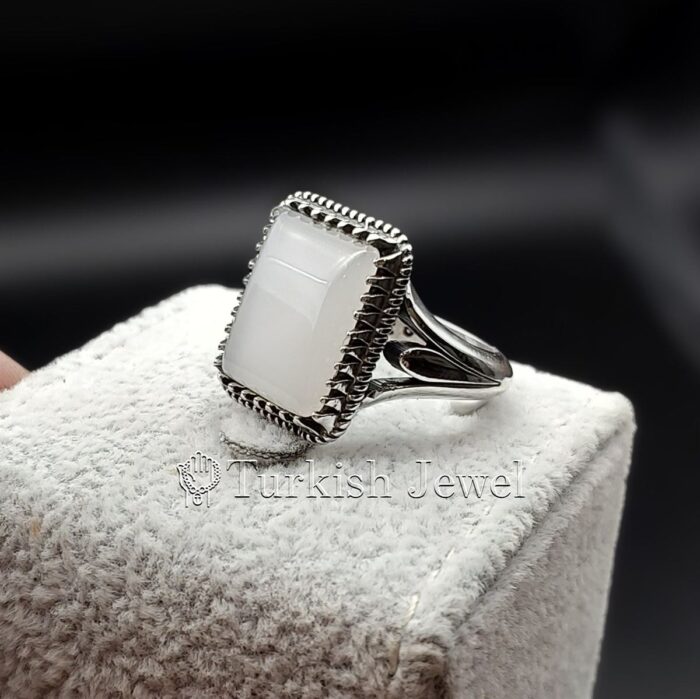 white aqeeq stone ring 925 Silver White agate 4 Turkish Jewel <h3>Hand Engraved - White Agate (White Aqeeq)</h3> Superior Quality Handmade Design on Sides. Pure and Natural White Agate (White Aqeeq) stone. Heavy and strong ring made with 925 Silver metal. <p class="LC20lb MBeuO DKV0Md">⭐ Highest Quality Silver 925</p> ⭐ Durable & Strong Design <p class="LC20lb MBeuO DKV0Md">⭐ Lifetime Silver Gurantee</p>