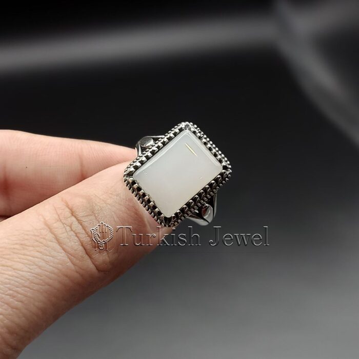 white aqeeq stone ring 925 Silver White agate 8 Turkish Jewel <h3>Hand Engraved - White Agate (White Aqeeq)</h3> Superior Quality Handmade Design on Sides. Pure and Natural White Agate (White Aqeeq) stone. Heavy and strong ring made with 925 Silver metal. <p class="LC20lb MBeuO DKV0Md">⭐ Highest Quality Silver 925</p> ⭐ Durable & Strong Design <p class="LC20lb MBeuO DKV0Md">⭐ Lifetime Silver Gurantee</p>