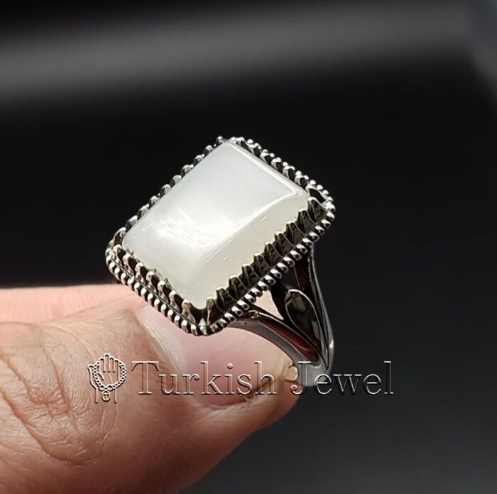 white aqeeq stone ring 925 Silver White agate 9 e1692095212509 Turkish Jewel <h3>Hand Engraved - White Agate (White Aqeeq)</h3> Superior Quality Handmade Design on Sides. Pure and Natural White Agate (White Aqeeq) stone. Heavy and strong ring made with 925 Silver metal. <p class="LC20lb MBeuO DKV0Md">⭐ Highest Quality Silver 925</p> ⭐ Durable & Strong Design <p class="LC20lb MBeuO DKV0Md">⭐ Lifetime Silver Gurantee</p>
